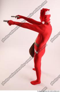 JOEL_ADAMSON CHRISTMAS VILLAIN WITH TWO GUNS